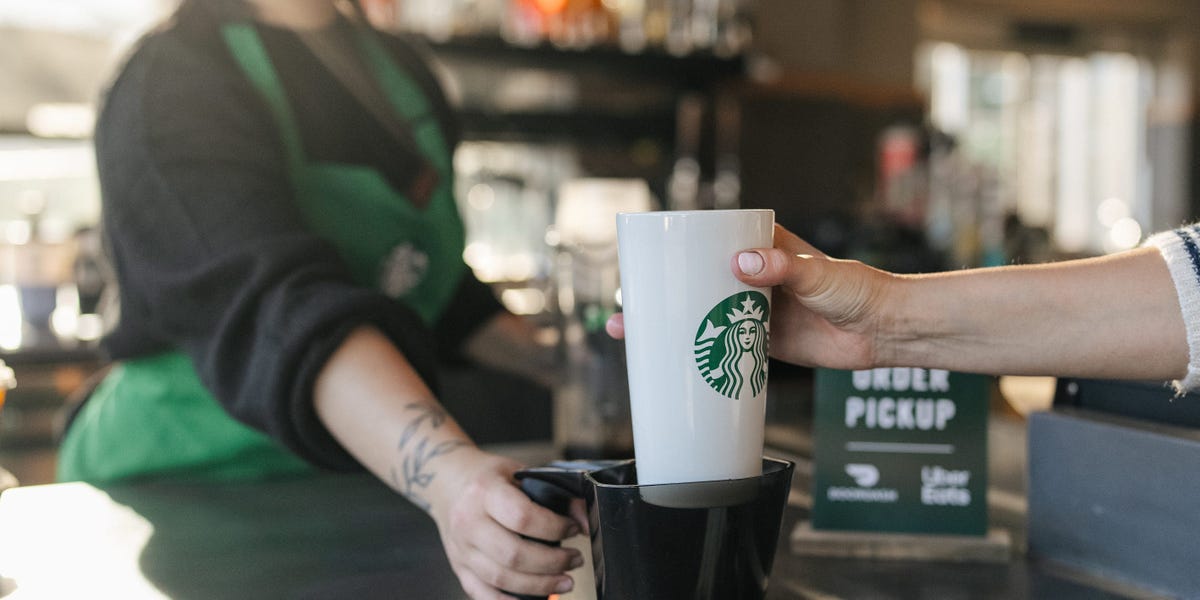 Featured image for "Starbucks' Reusable Cup Policy Stirs Concern Among Baristas and Customers"