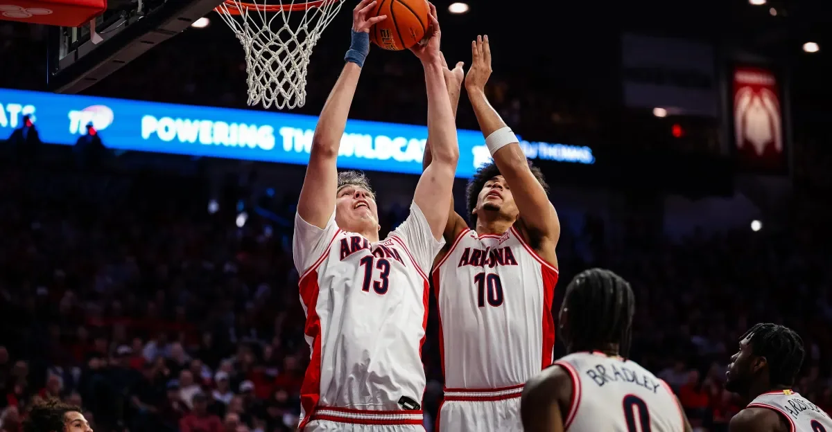 Top-ranked Arizona routs West Virginia to stay unbeaten at 20-0