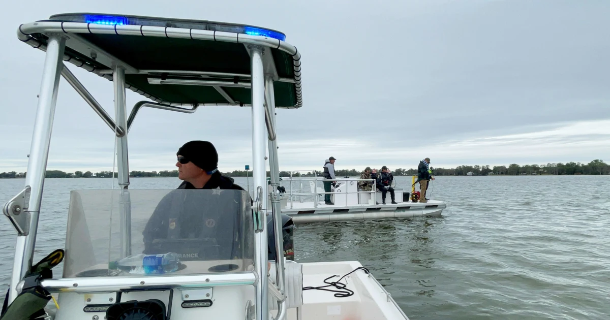 Featured image for "Florida authorities search for missing boaters in Lake Eloise near Legoland"