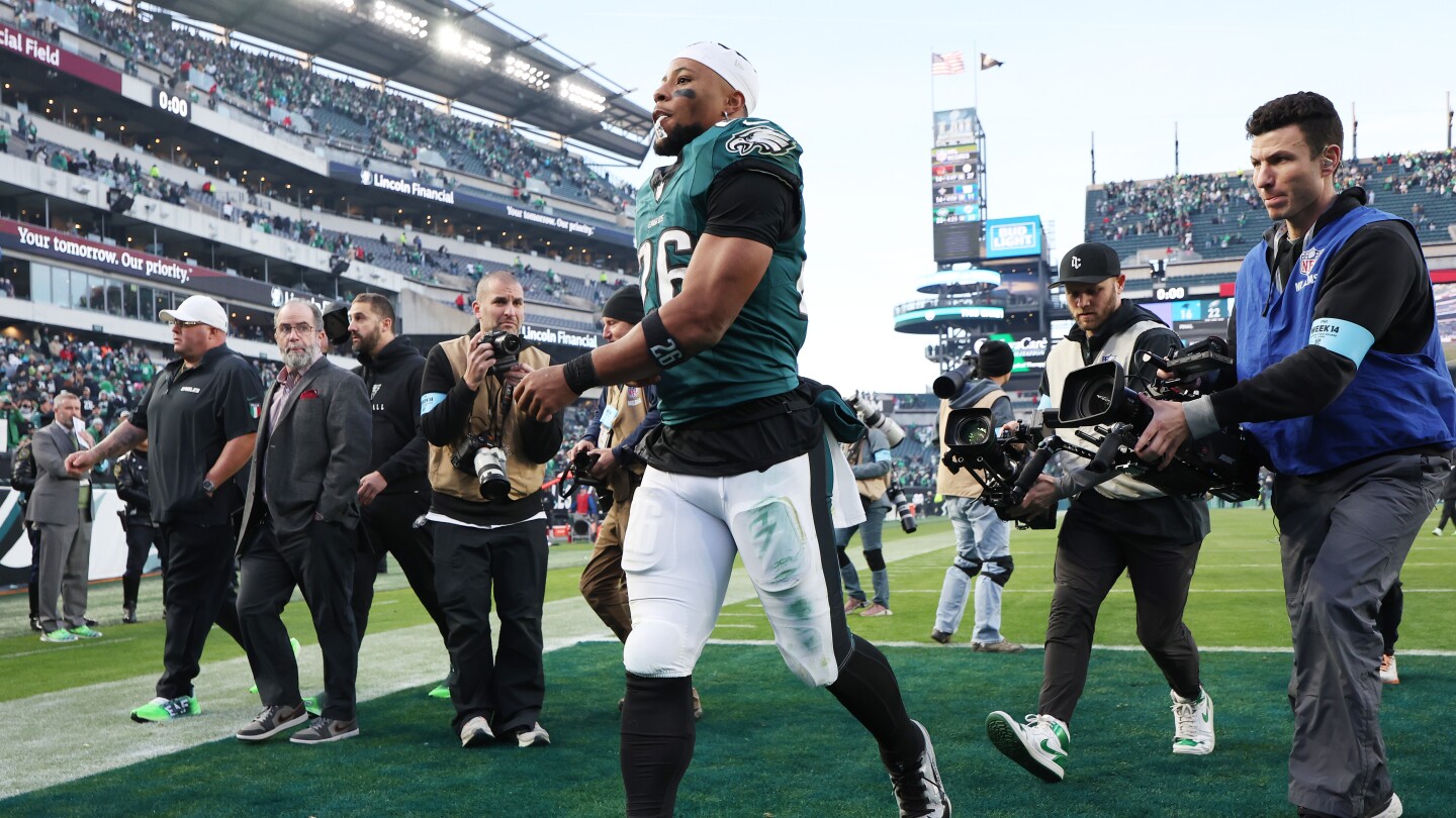 Featured image for Saquon Barkley Shatters Eagles' Rushing Record, Eyes NFL Milestone