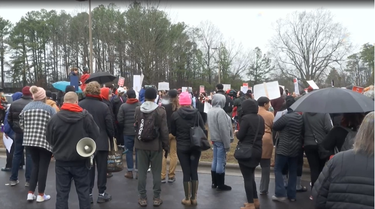 Featured image for "Mass Staff Absences Force Closure of 12 Durham Public Schools for Protests"