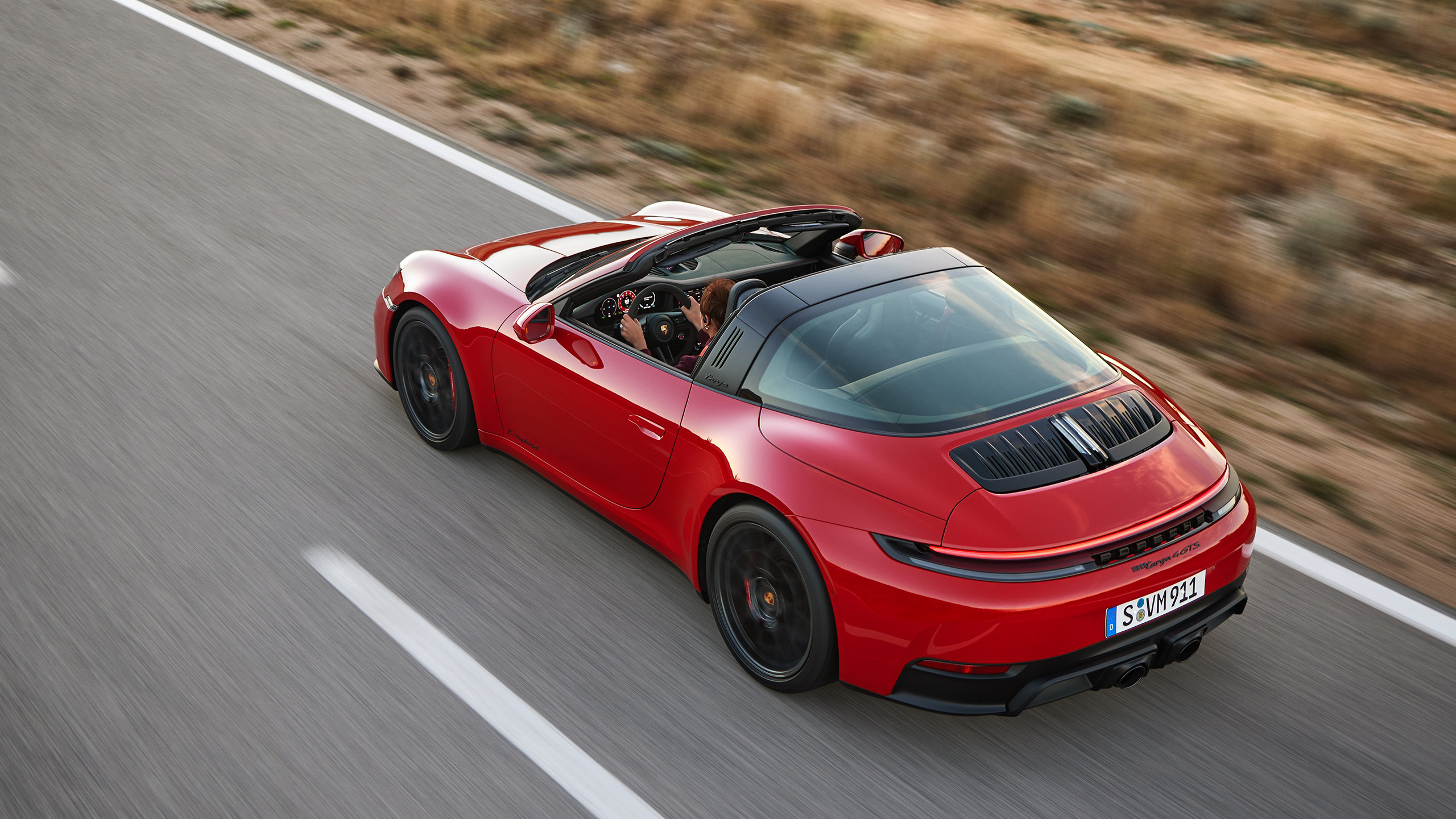 Featured image for "Porsche Unveils First-Ever 911 Hybrid, Phasing Out Manual in 2025"