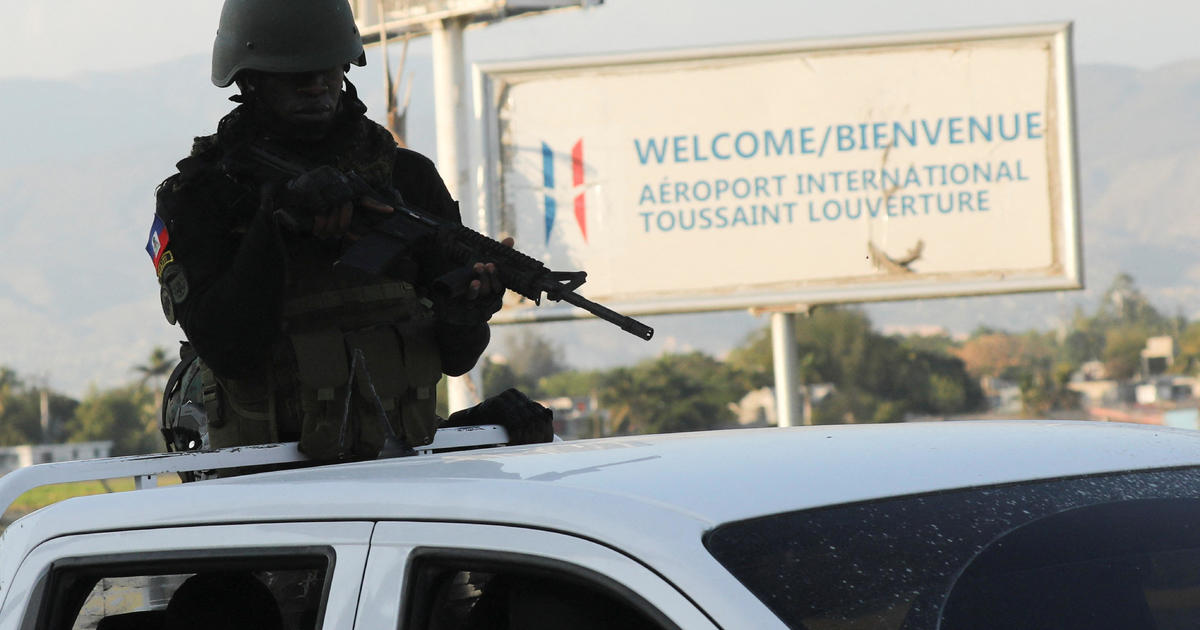 "Haiti's Escalating Crisis: Gangs Target Airport, Leader's Whereabouts Unknown"