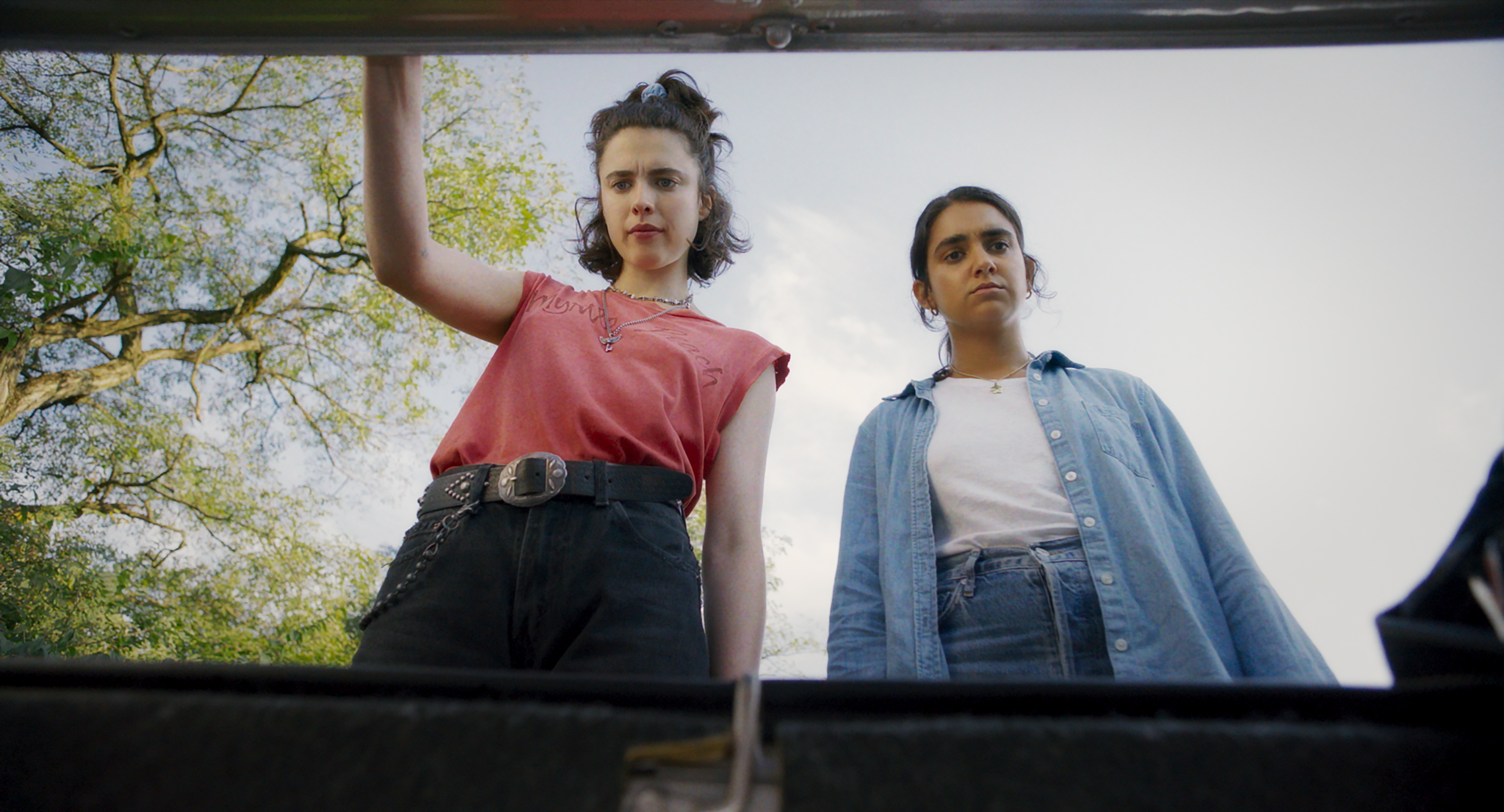 Featured image for Margaret Qualley and Geraldine Viswanathan star in Ethan Coen's wacky crime comedy 'Drive-Away Dolls' trailer.