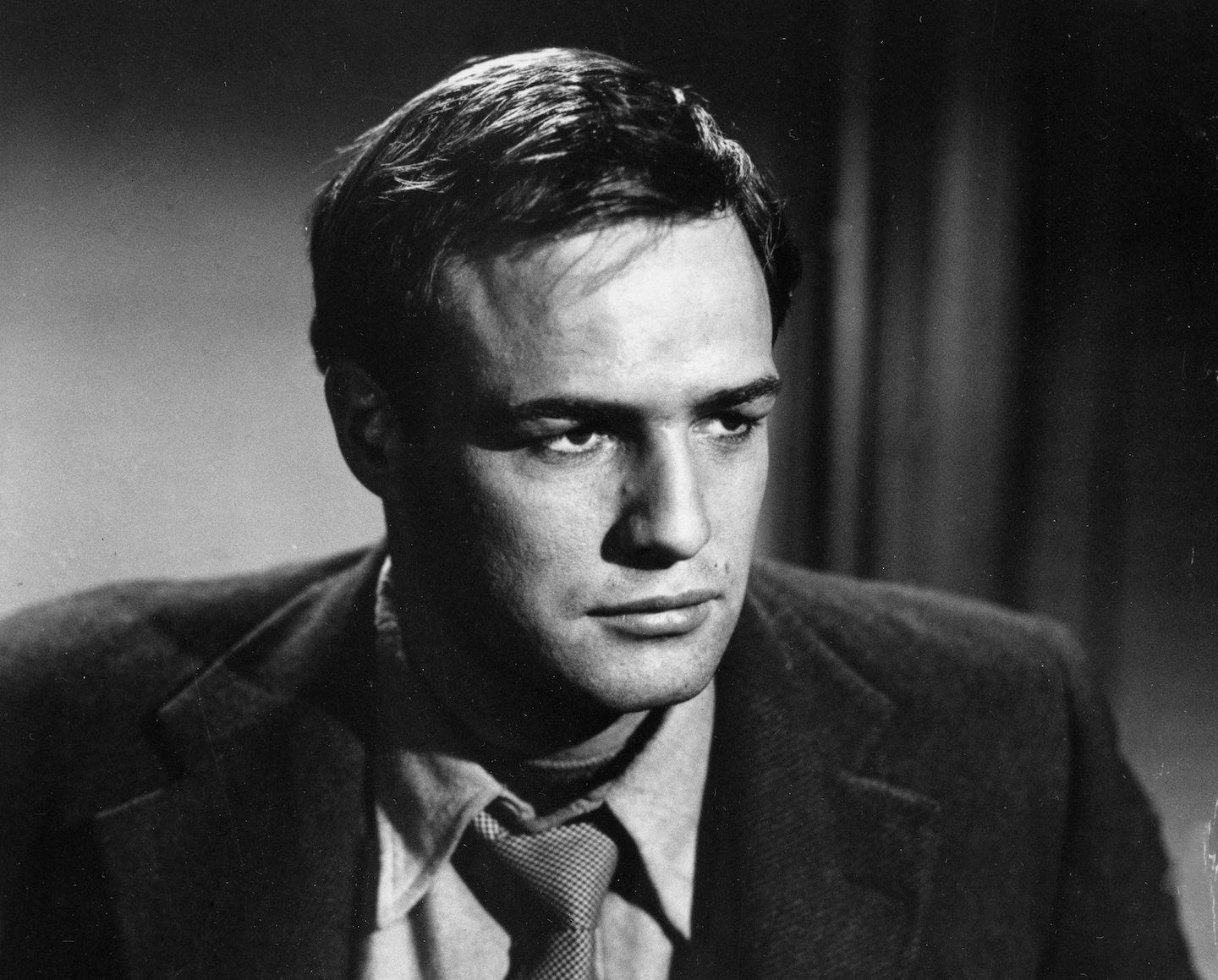 Featured image for "Marlon Brando's Enduring Legacy: From Acting Revolution to Oscar Controversy"