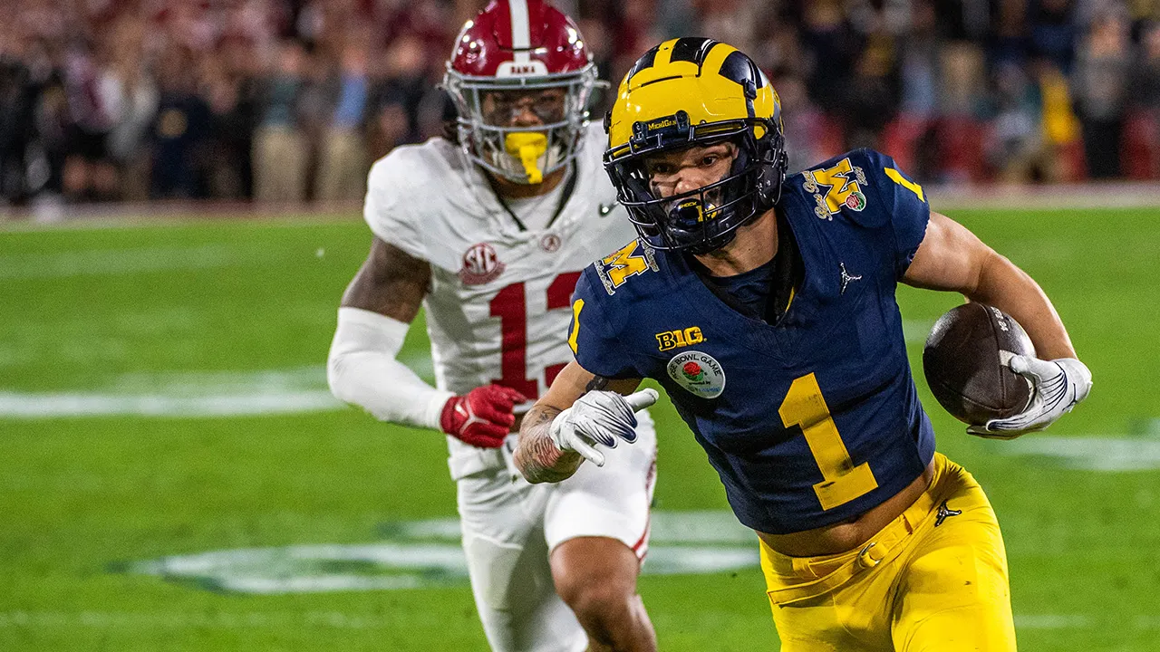 "Michigan Celebrates Rose Bowl Triumph with Locker Room Antics and Defensive Prowess"