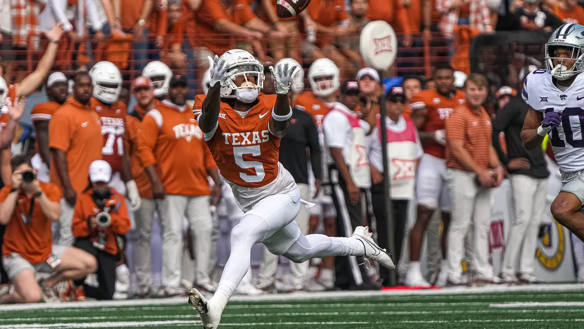 "Texas Holds On for Overtime Victory Against Kansas State"