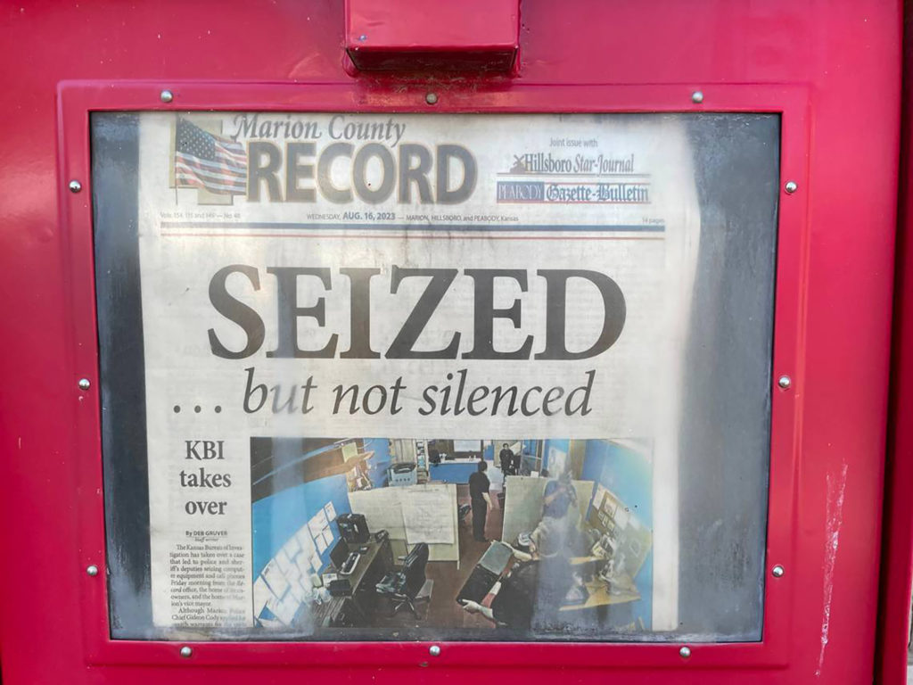 "Police Raid on Kansas Newspaper Publisher's Home Captures 98-Year-Old Mother's Upset"