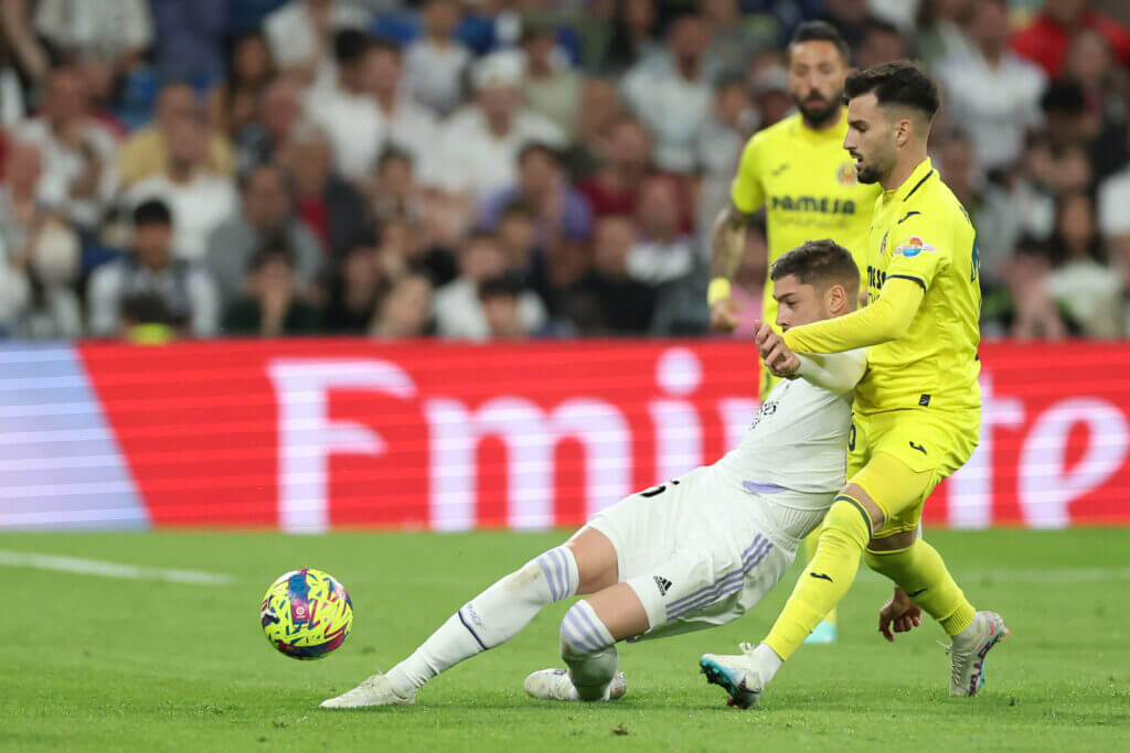 Real Madrid's Valverde punches Villarreal player after match.