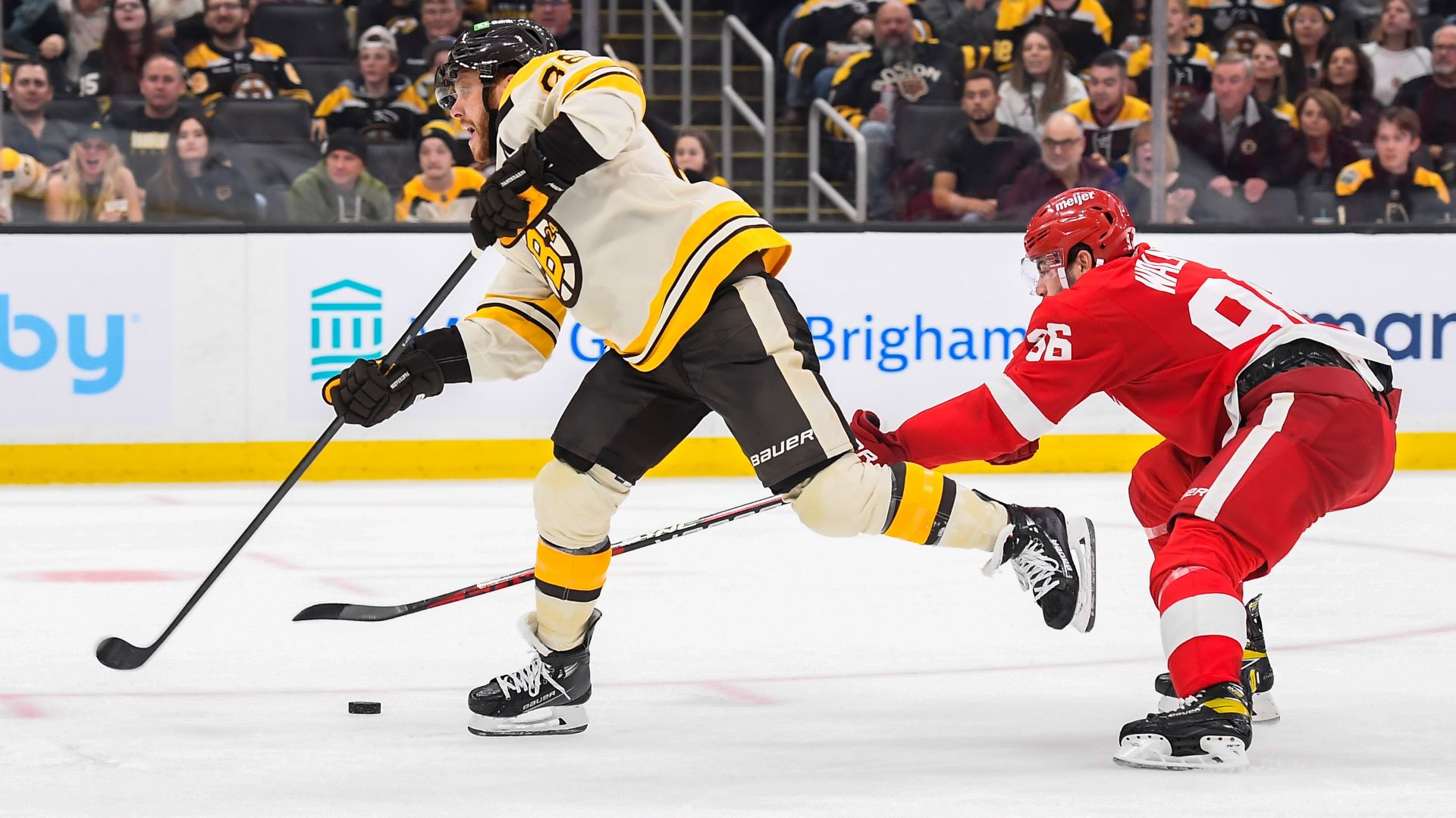 Featured image for "Pastrnak Shines as Bruins Dominate Red Wings in NHL Showdown"