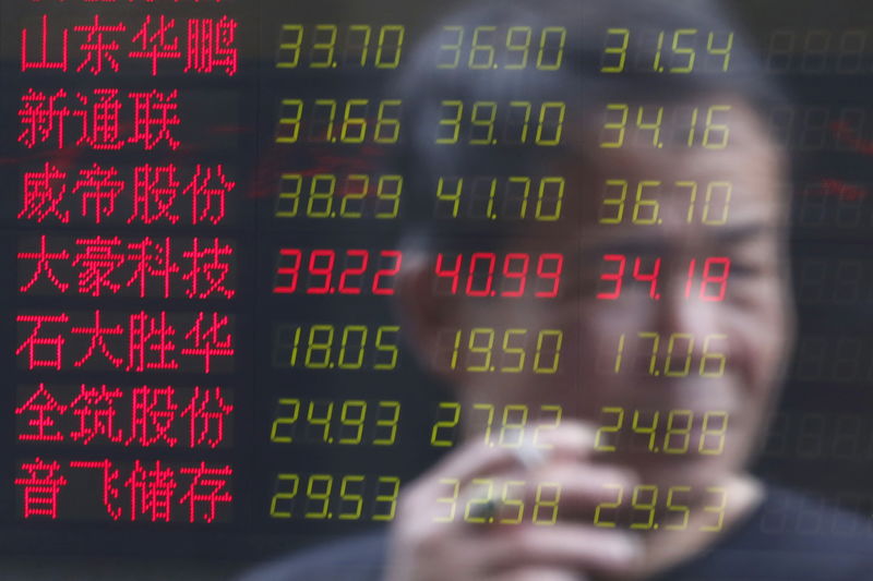Featured image for "Asia Stocks Tumble as Rate-Cut Hopes Fade and China's Growth Slows"