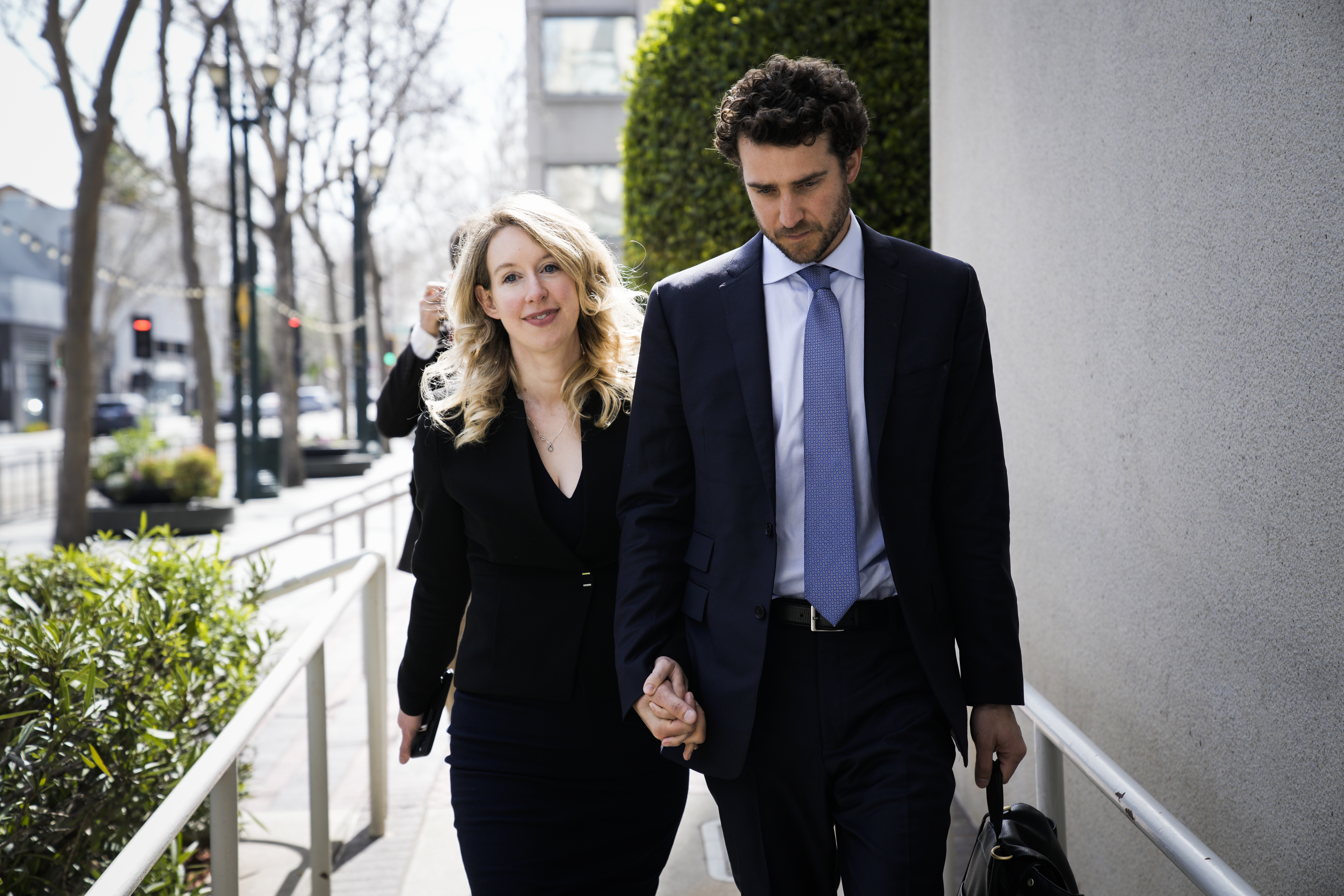 Elizabeth Holmes denied request to remain free during appeal and must report to prison.
