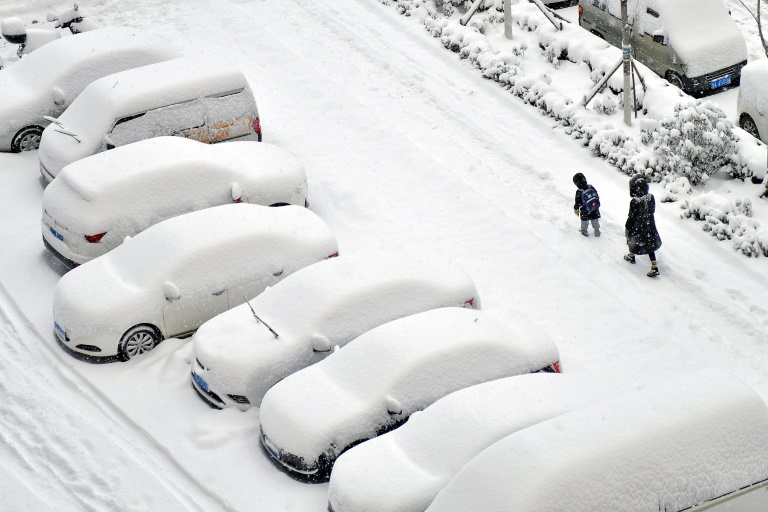 China's Record-Breaking Cold Snap: Snow, Train Crash, and Historic Architecture