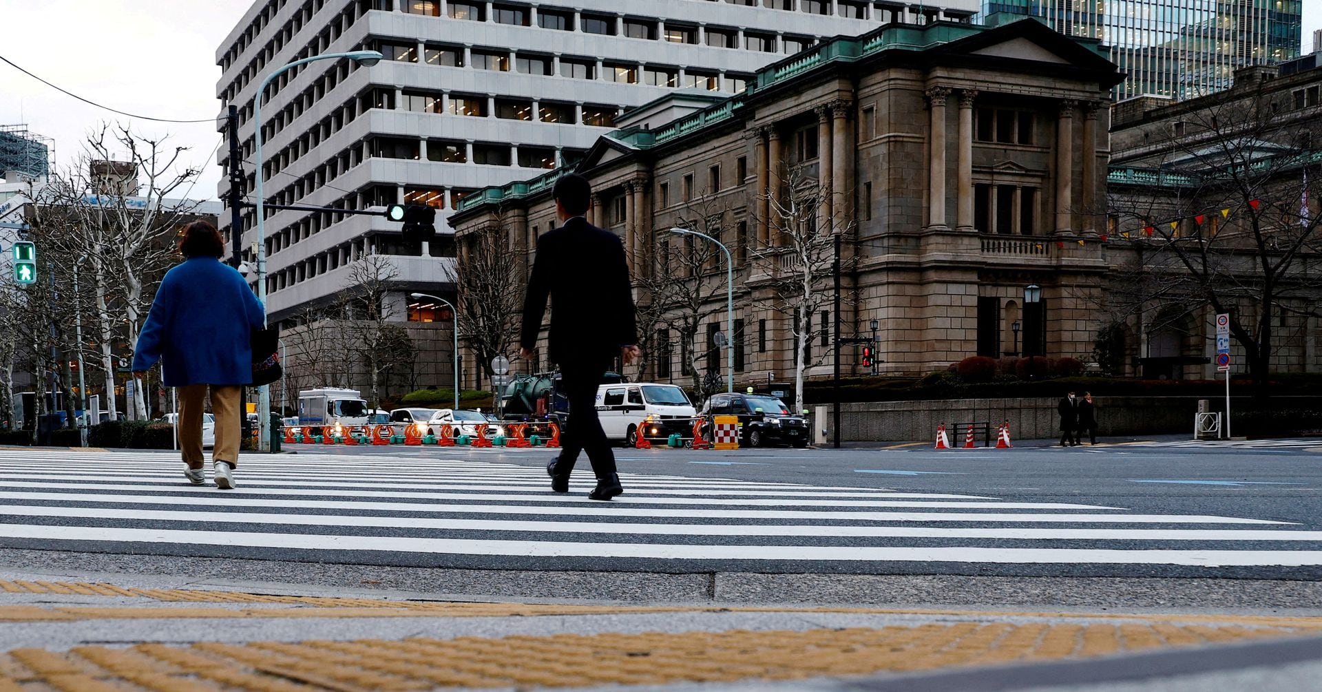 "Japan's Economy Avoids Recession with Q4 Growth Revision"