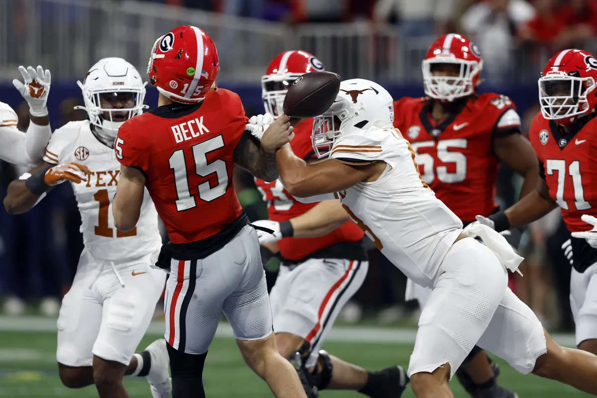 Featured image for Georgia Wins SEC Title in OT Despite Carson Beck's Injury Drama