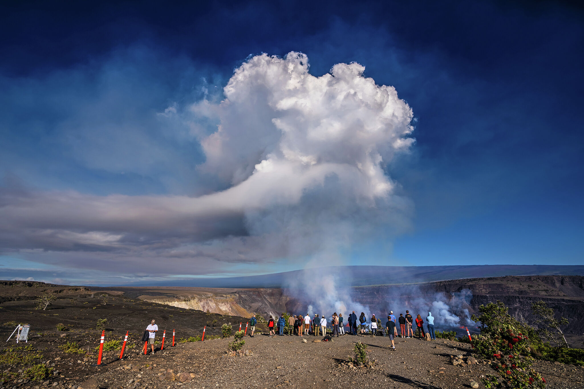 Featured image for Kilauea volcano's fiery eruption captivates tourists and photographers.