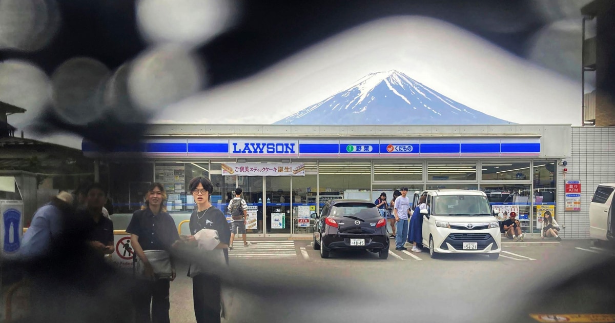 Featured image for Tourists Poke Holes in Mount Fuji View Barrier