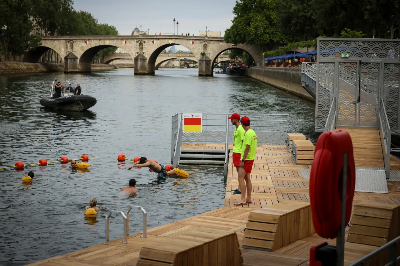 Featured image for Parisians Celebrate Centennial with Seine River Dive