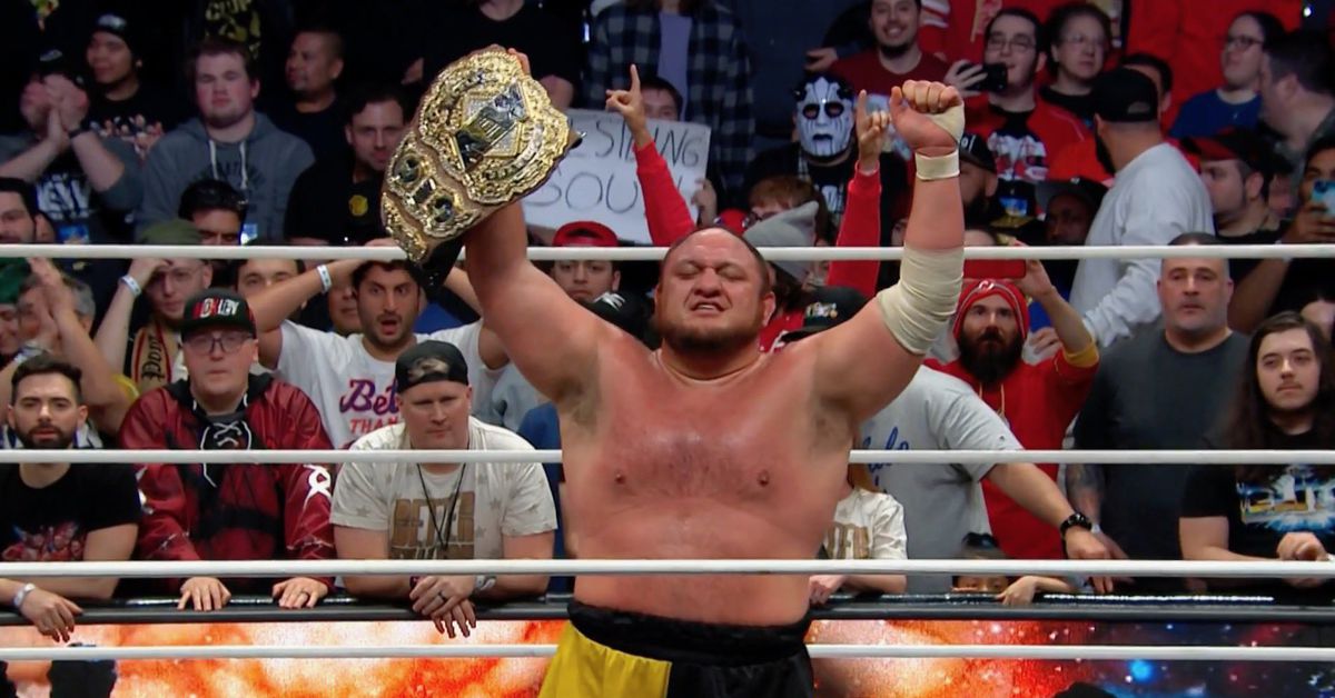 Featured image for "Samoa Joe Triumphs as AEW's New World Champion, Unmasking The Devil at Worlds End Spectacle"