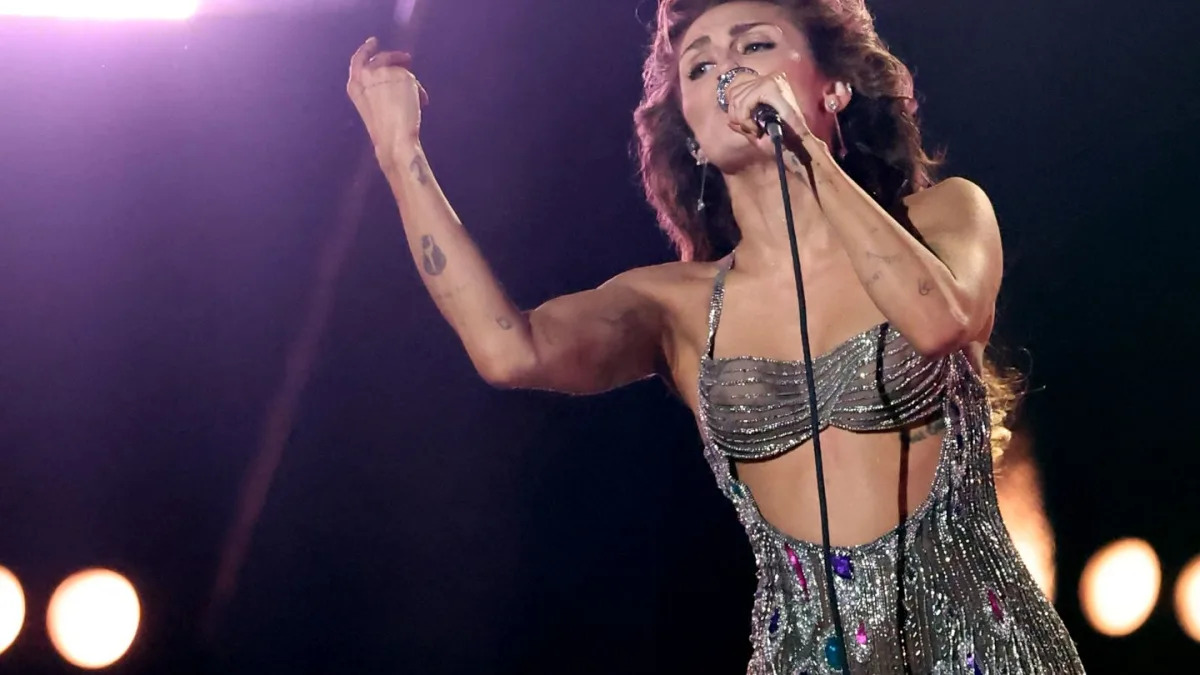 Featured image for "Miley Cyrus' 2024 Grammys Performance of 'Flowers' Sparks Controversy with Ex"