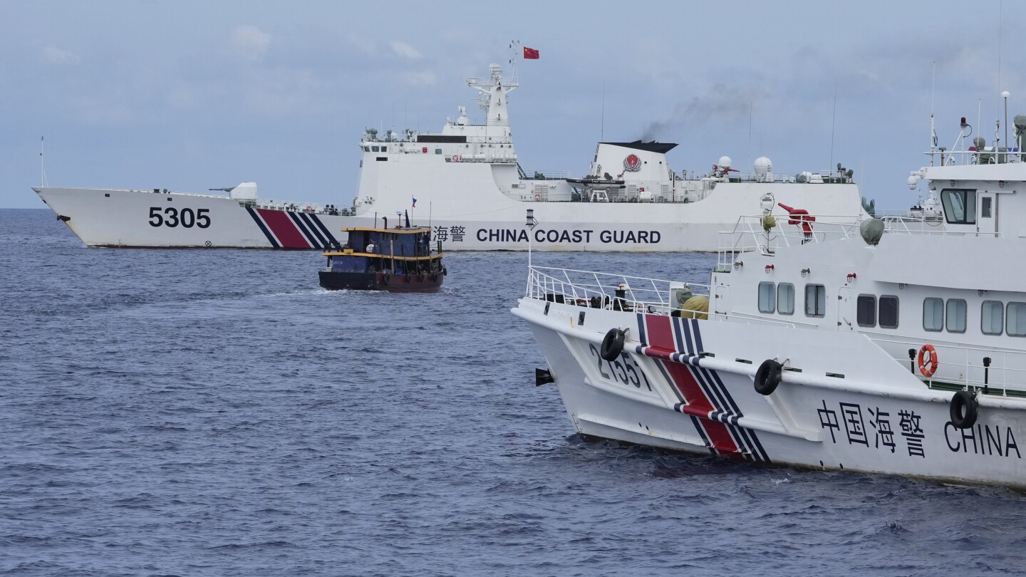 "Philippine Supply Boats Defy Chinese Coast Guard Blockade in South China Sea"
