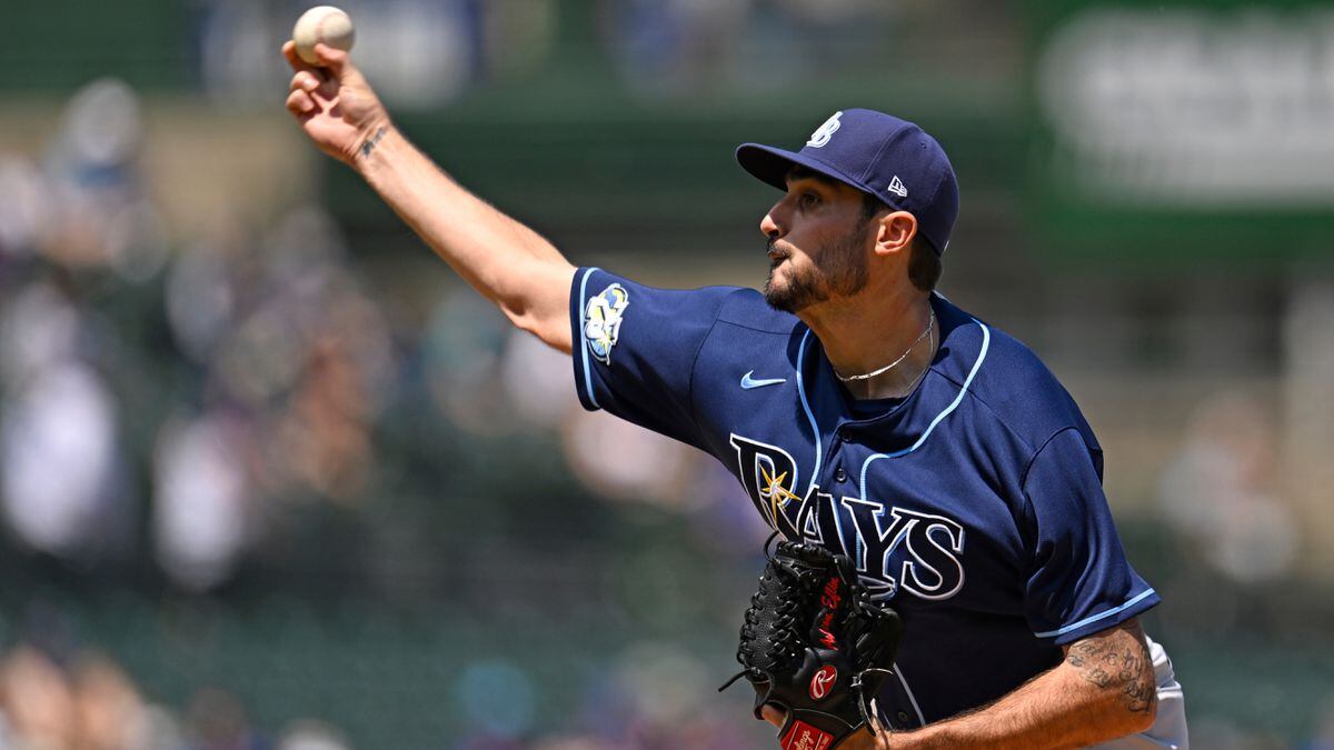 Featured image for Rays narrowly defeat Cubs in PitchCom plagued game.