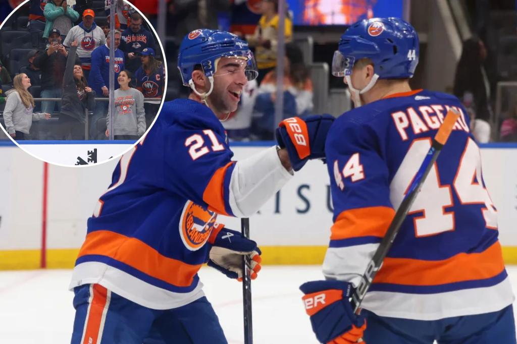 Featured image for "Islanders Dominate Bruins with Palmieri's Historic Hat Trick"