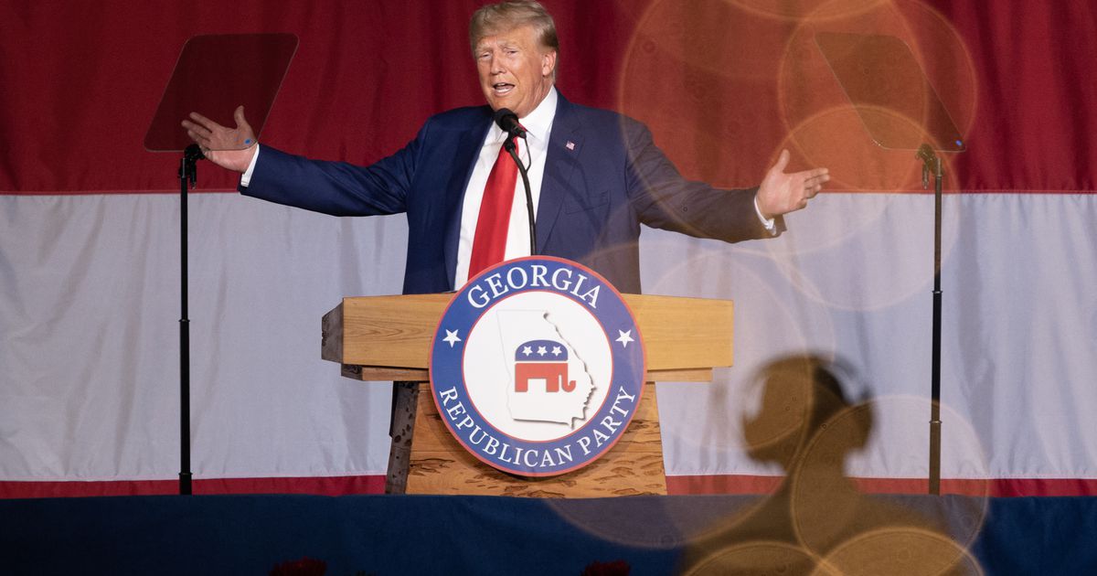 Trump's defiant return to Georgia after federal indictment.