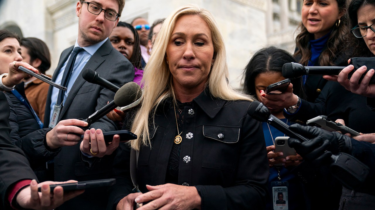 "Greene Challenges Johnson on Ukraine Aid and Border Policies"
