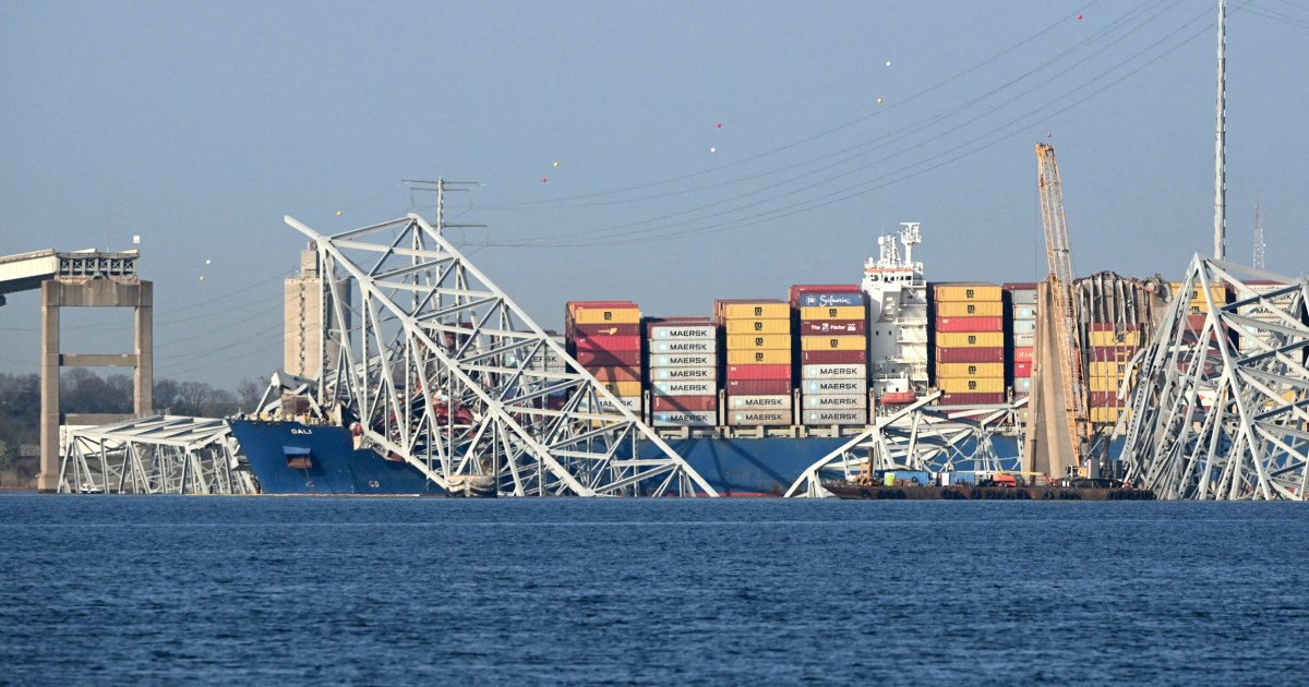 Featured image for "Baltimore Bridge Collapse: Cranes Begin Wreckage Removal as Wife of Victim Remains Missing"