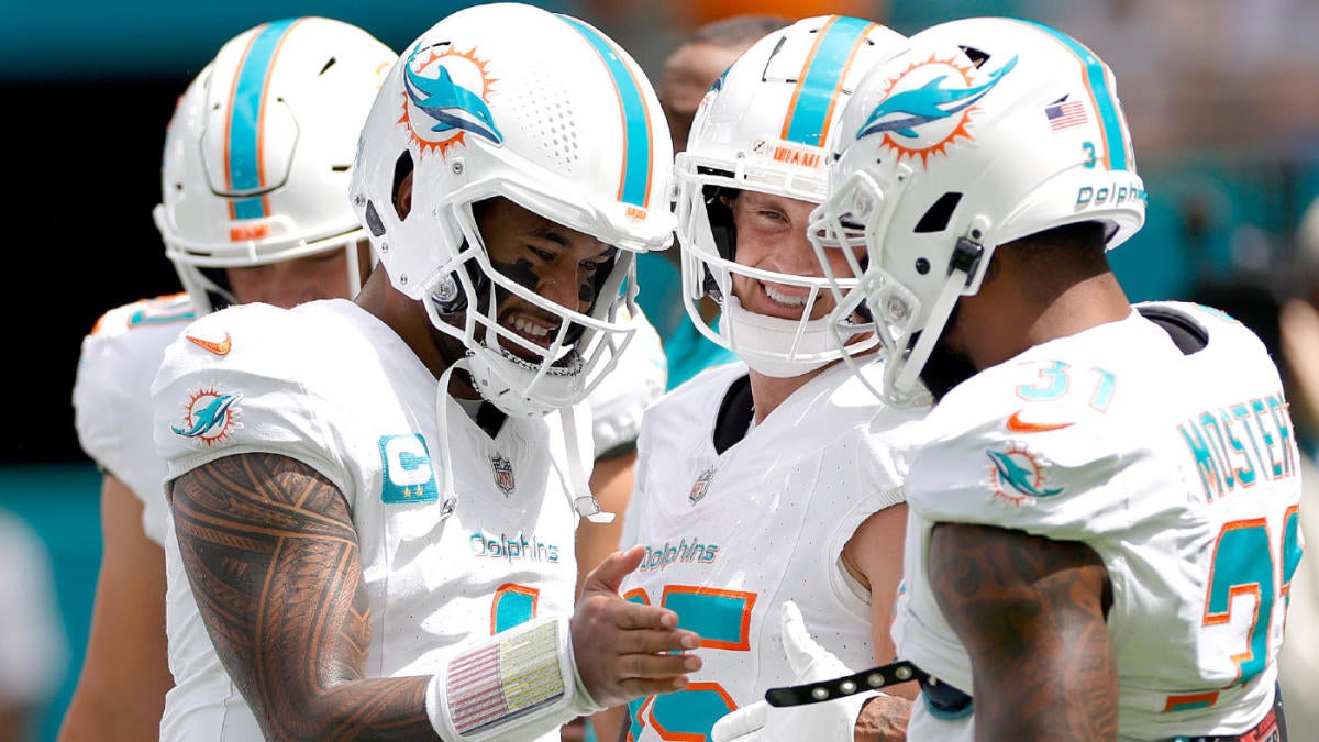 "Dolphins Make History with 70-Point Victory over Broncos"