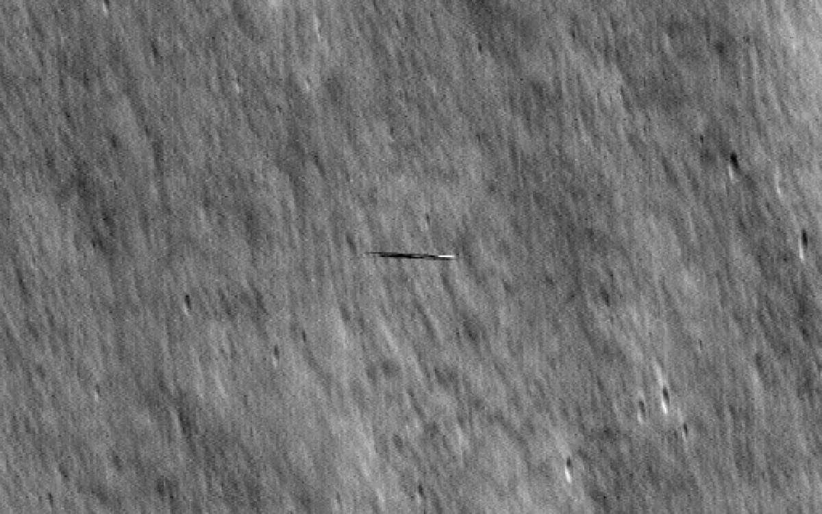 Featured image for "Mysterious Surfboard-Shaped Object Spotted Orbiting Moon by NASA"