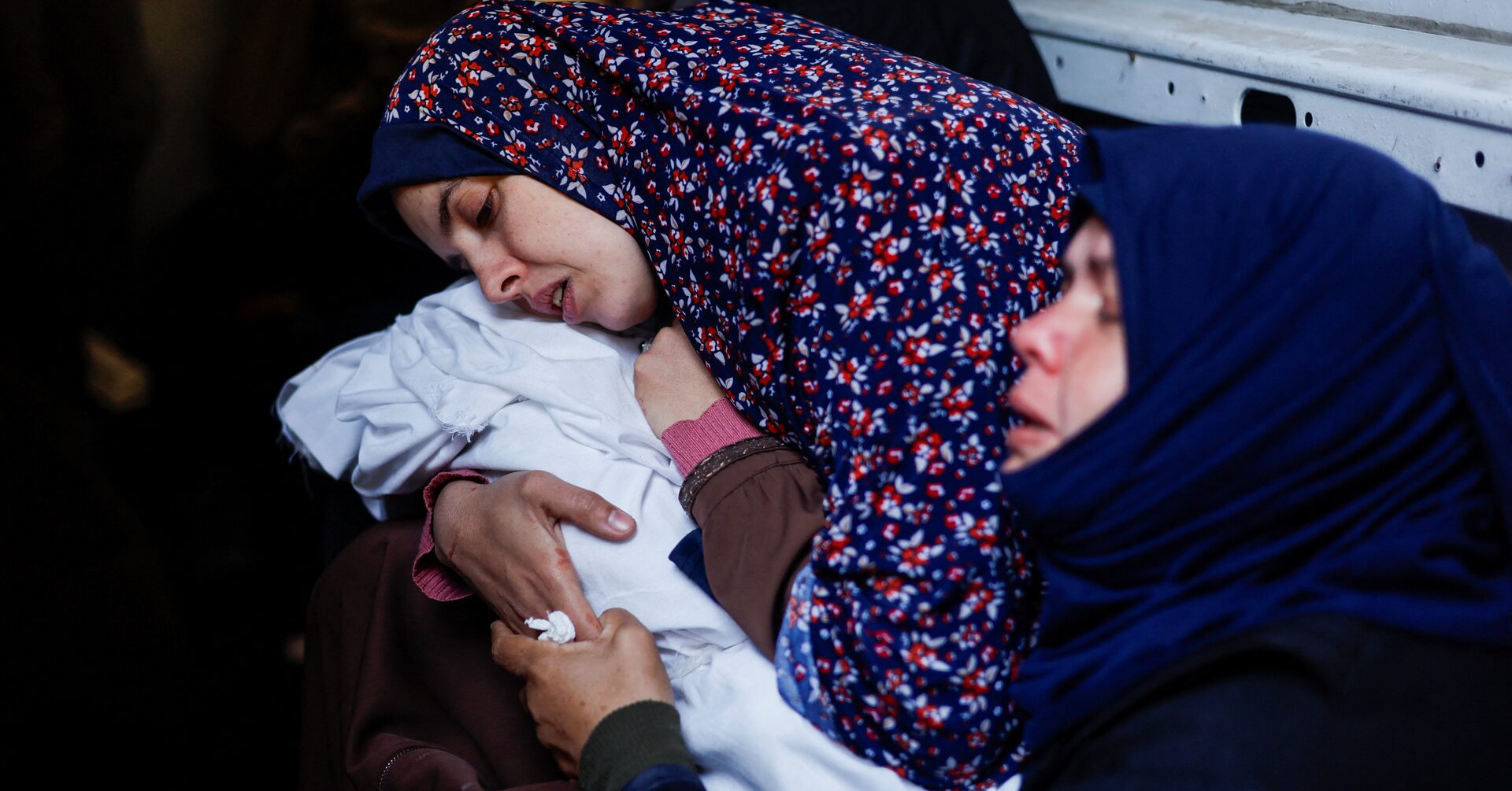 "Tragic Loss: Infant Twins Buried in Rafah Amid Israeli Airstrikes"