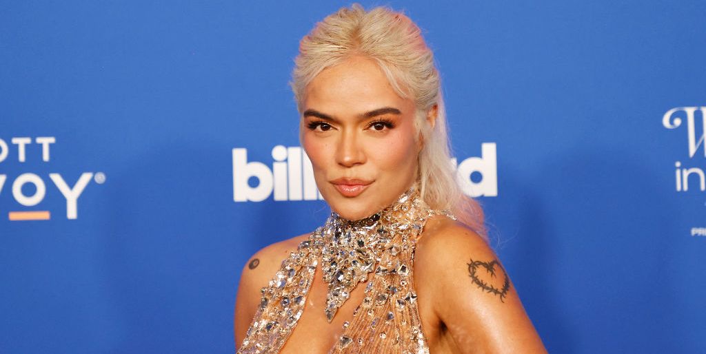 Featured image for "Karol G's Dazzling Red Carpet Moments at Billboard Women in Music 2024"