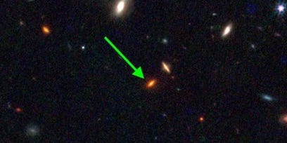 "Unveiling the Impossible: James Webb Telescope's Discovery of a 13 Billion-Year-Old Galaxy"