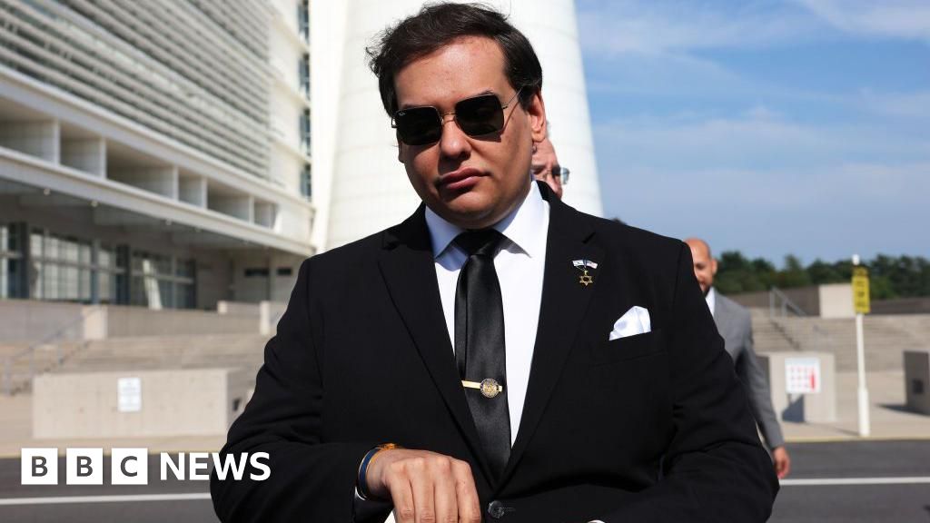 Featured image for George Santos Begins 7-Year Federal Prison Term Amid Scandal