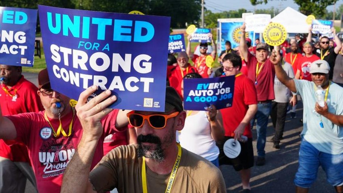 Elon Musk's Influence Fuels Historic UAW Strikes
