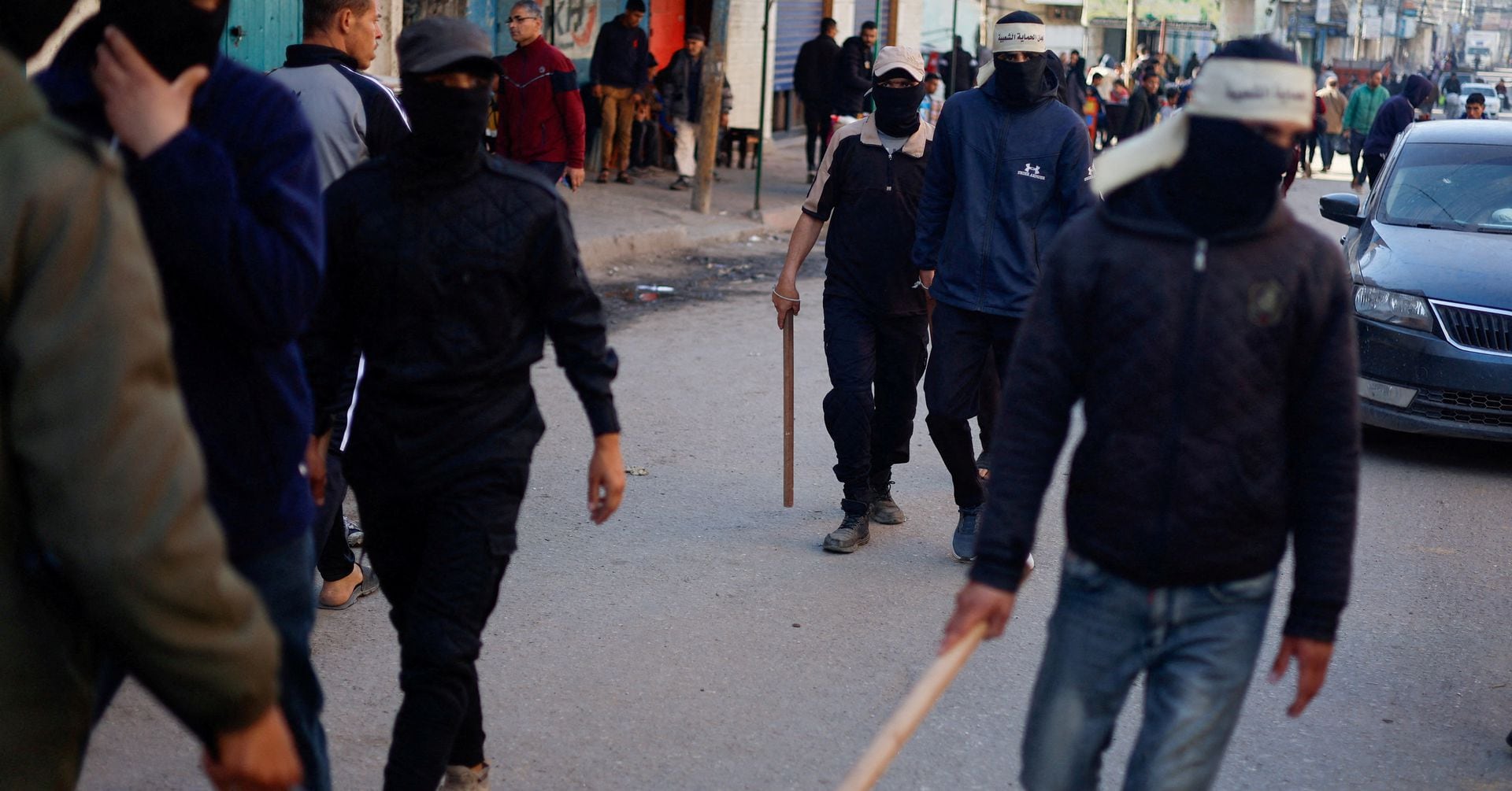 "Masked Vigilantes Enforce Order in Gaza's Absence of Police"