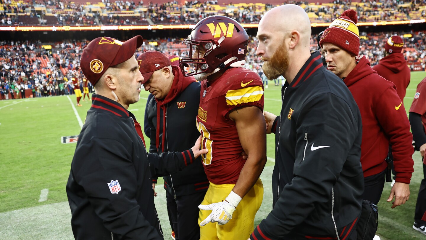 Featured image for Commanders' Austin Ekeler Hospitalized After Concussion Against Cowboys