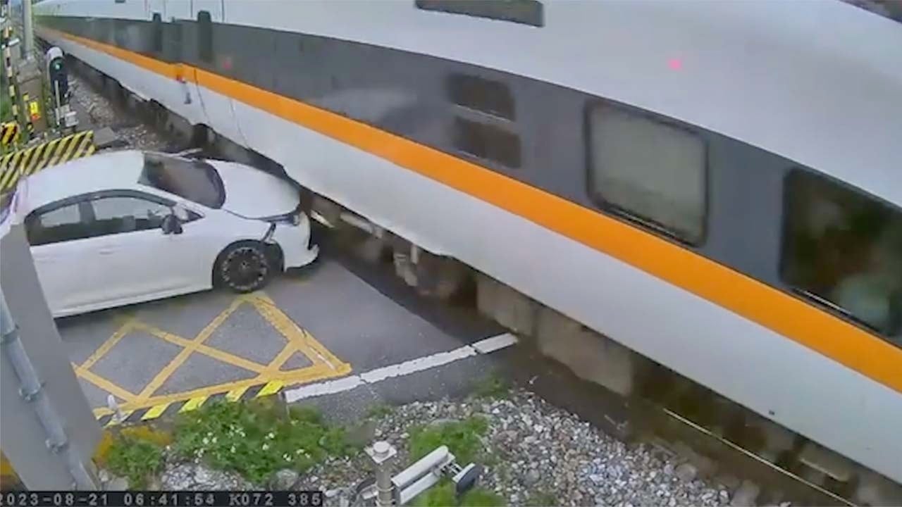 Drunk Driver's Shocking Collision with Speeding Train Caught on Video