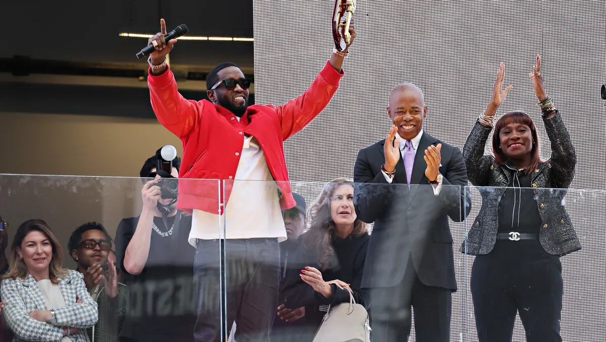 "Diddy Receives Key to NYC and Dazzles with Rainbow Rolex"