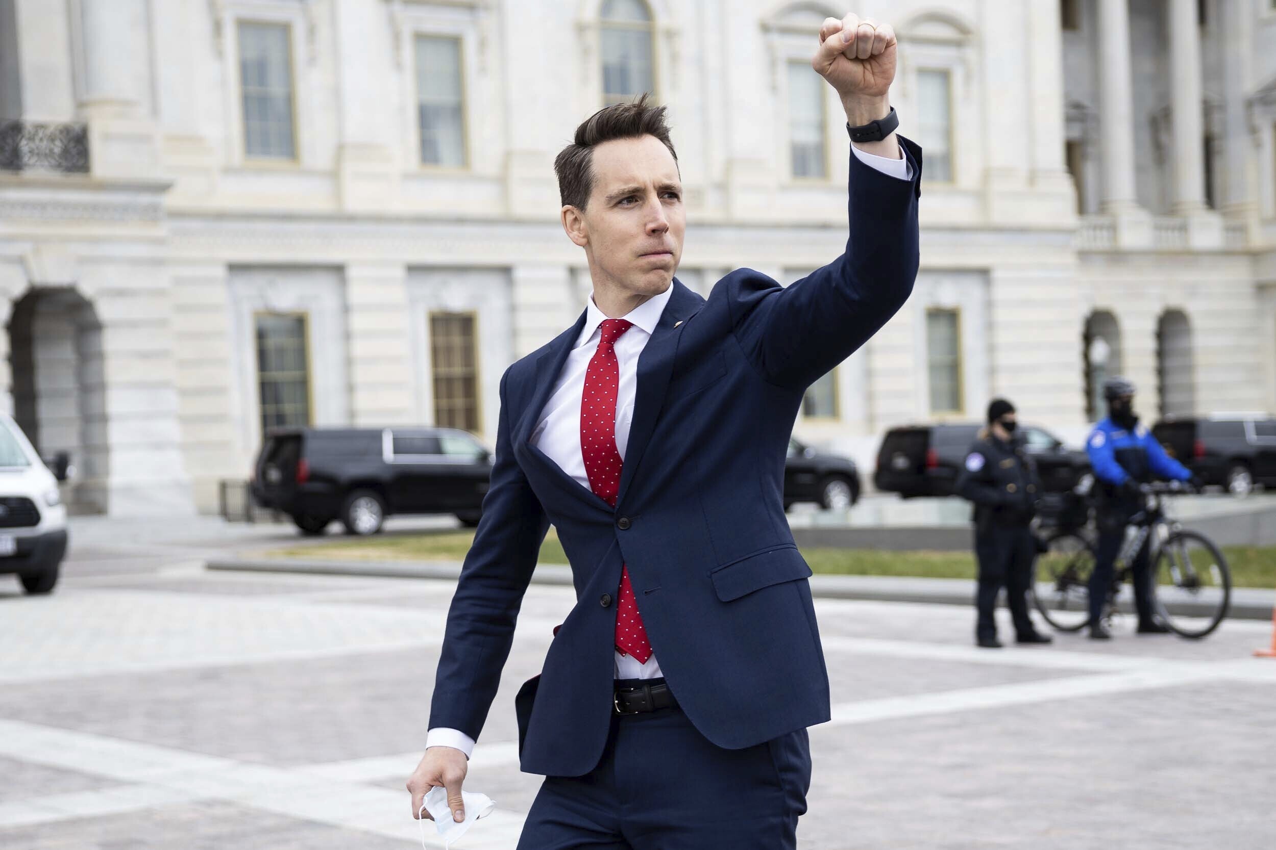"Deciphering Josh Hawley's Jan. 6 Fist Pump: Insights from the Photographer and His Home State Rebuke"