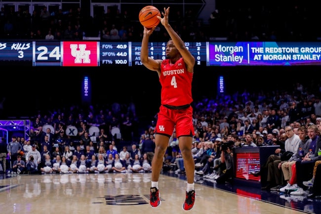 "Cryer Leads No. 3 Houston to Victory Over Texas in College Basketball Showdown"