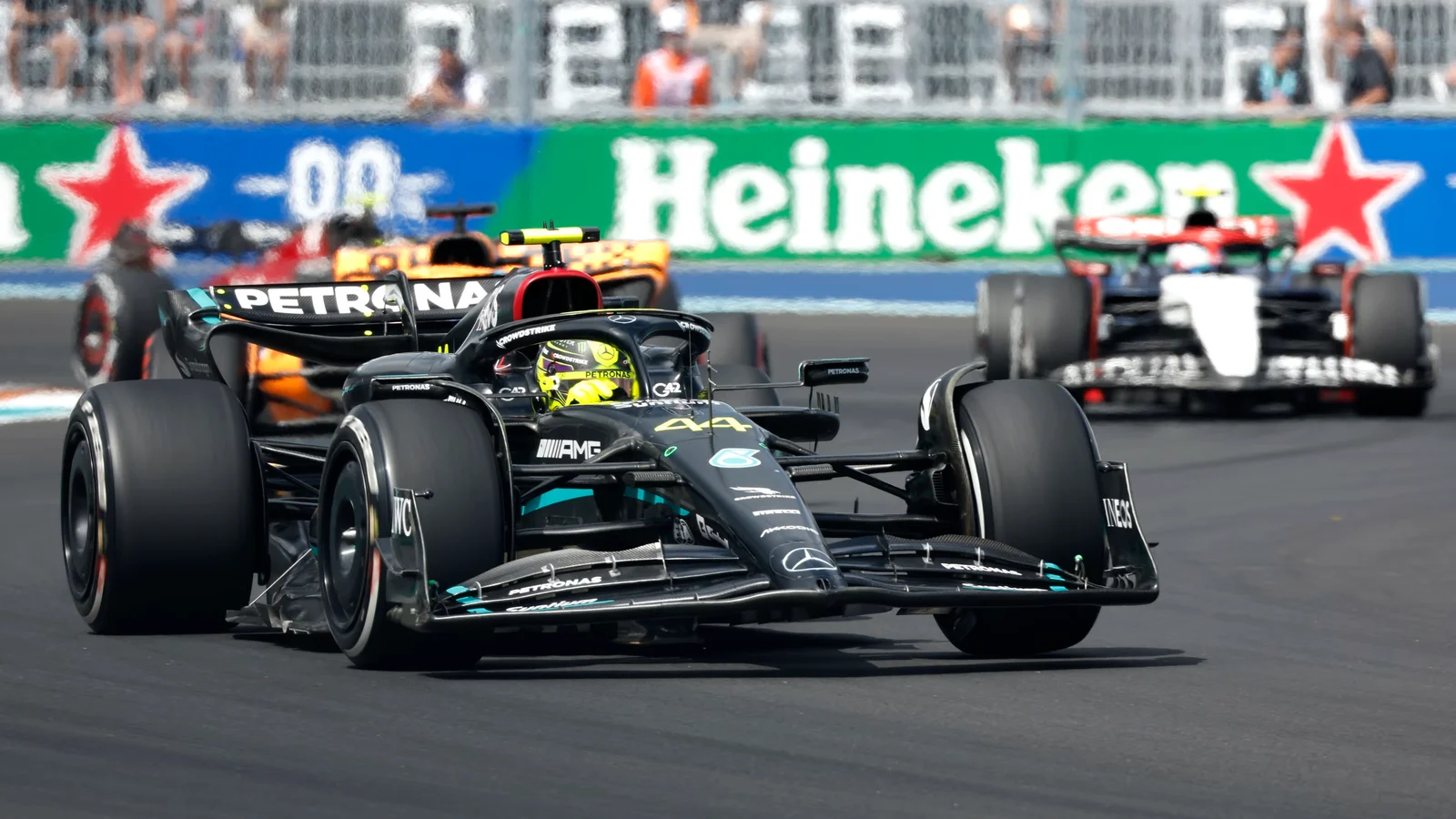 Verstappen dominates Miami Grand Prix, Hamilton awaits upgrades.