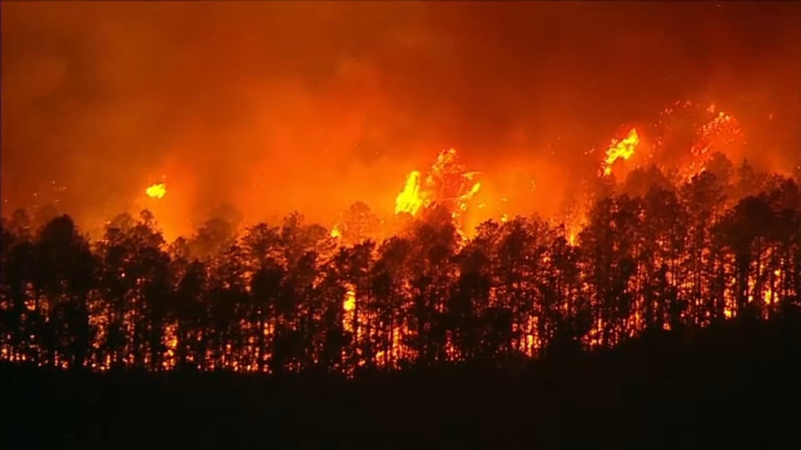 Featured image for Wildfire Rages Through Multiple Towns in New Jersey, Forcing Evacuations and Highway Closures