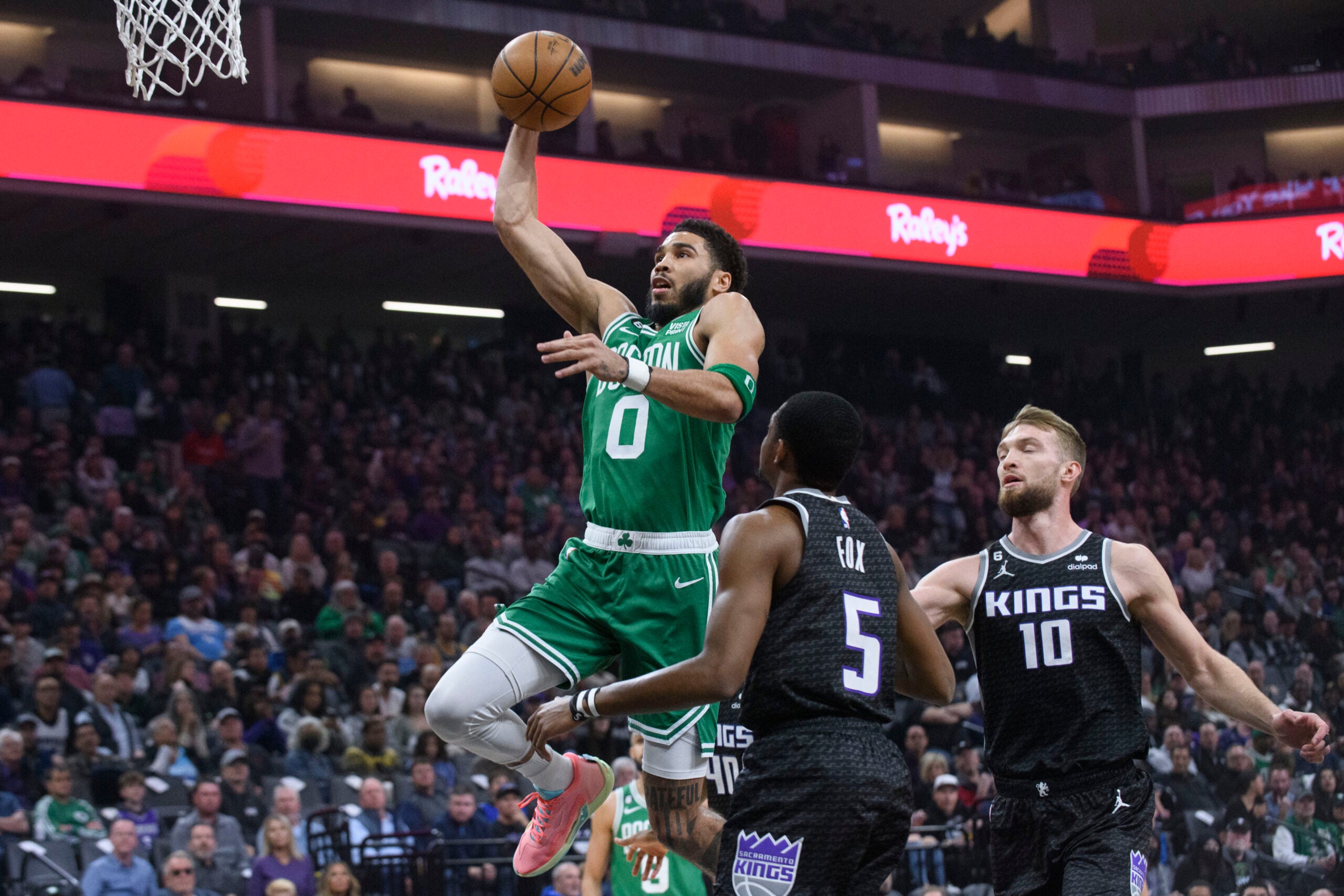 "Celtics dominate Kings on the road with Tatum and Brown leading the way"