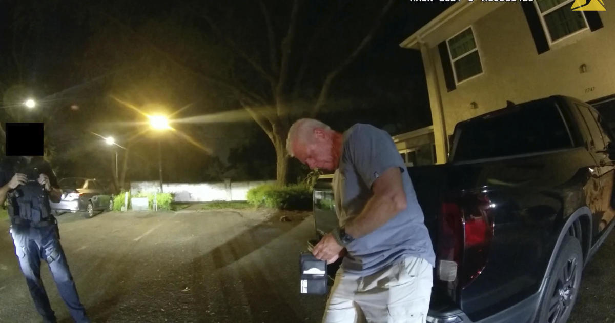 Featured image for Federal Drug Prosecutor Offers Business Card to Cops in DUI Crash Arrest: Bodycam Footage Reveals