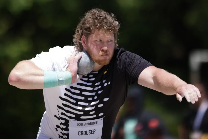 Ryan Crouser shatters shot put world record at L.A. Grand Prix with new technique.
