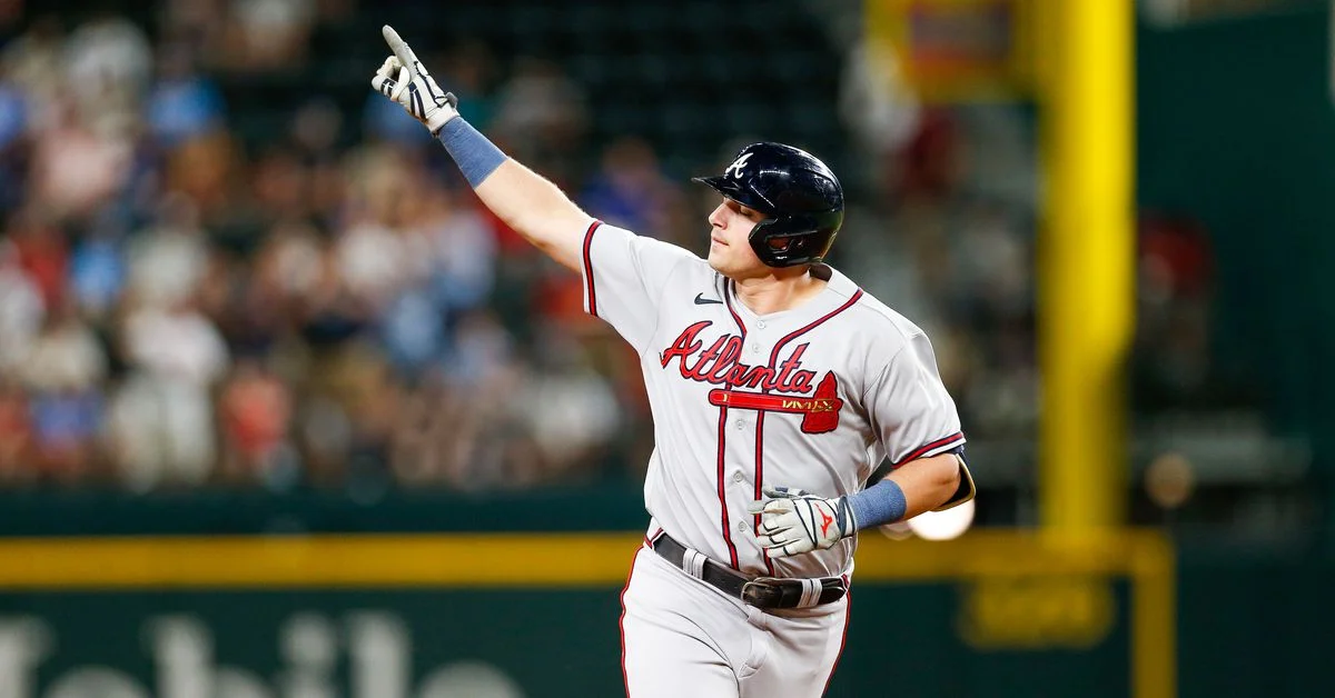 Braves dominate Rangers with 12-0 victory to end slump.