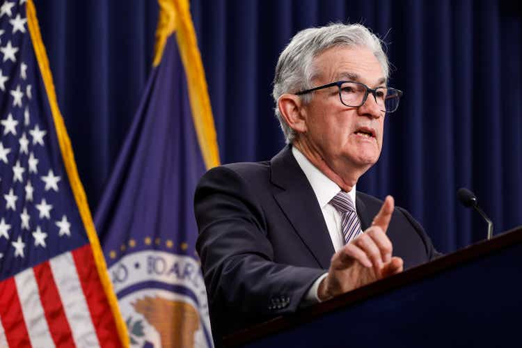 Fed Chair Powell Signals More Rate Hikes Despite Cooling Inflation